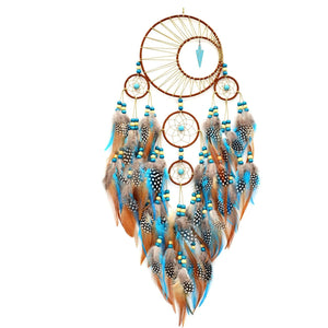 Close-up of hoop weave and turquoise arrowhead pendant