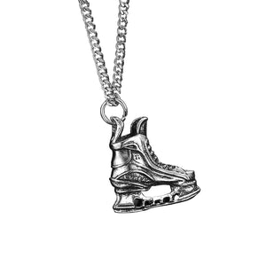 Ice skate pendant angled view showing skate blade detail