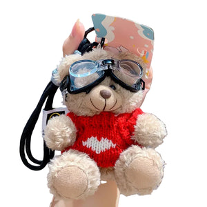 Red heart sweater goggle bear plush keychain – close-up on decorative card backing