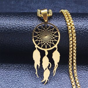 Gold dream catcher necklace close-up on dark background – pendant detail