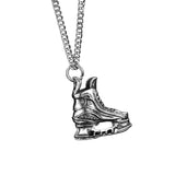 Ice skate pendant angled view showing skate blade detail