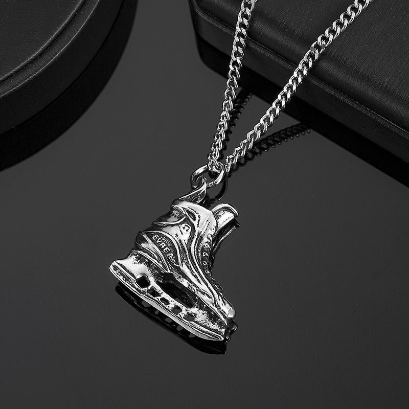 Ice skate pendant front view on dark background