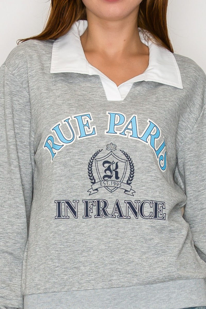 Collared Contrast Fleece Top - close up graphic detail