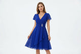 Chiffon Wrap Midi Dress with Flutter Sleeves and Rhinestone Brooch